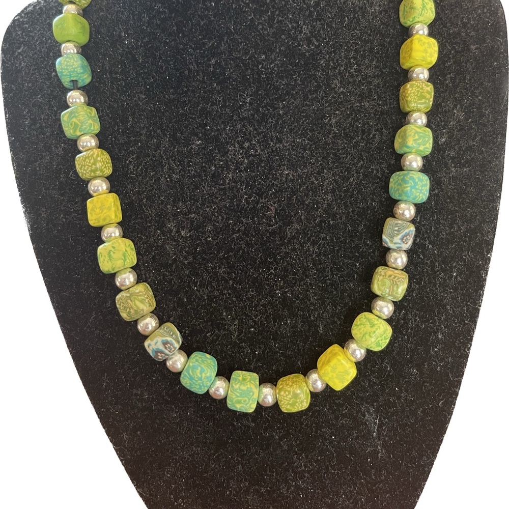 Round Stretch necklace, square and round gold beads. multi color green.